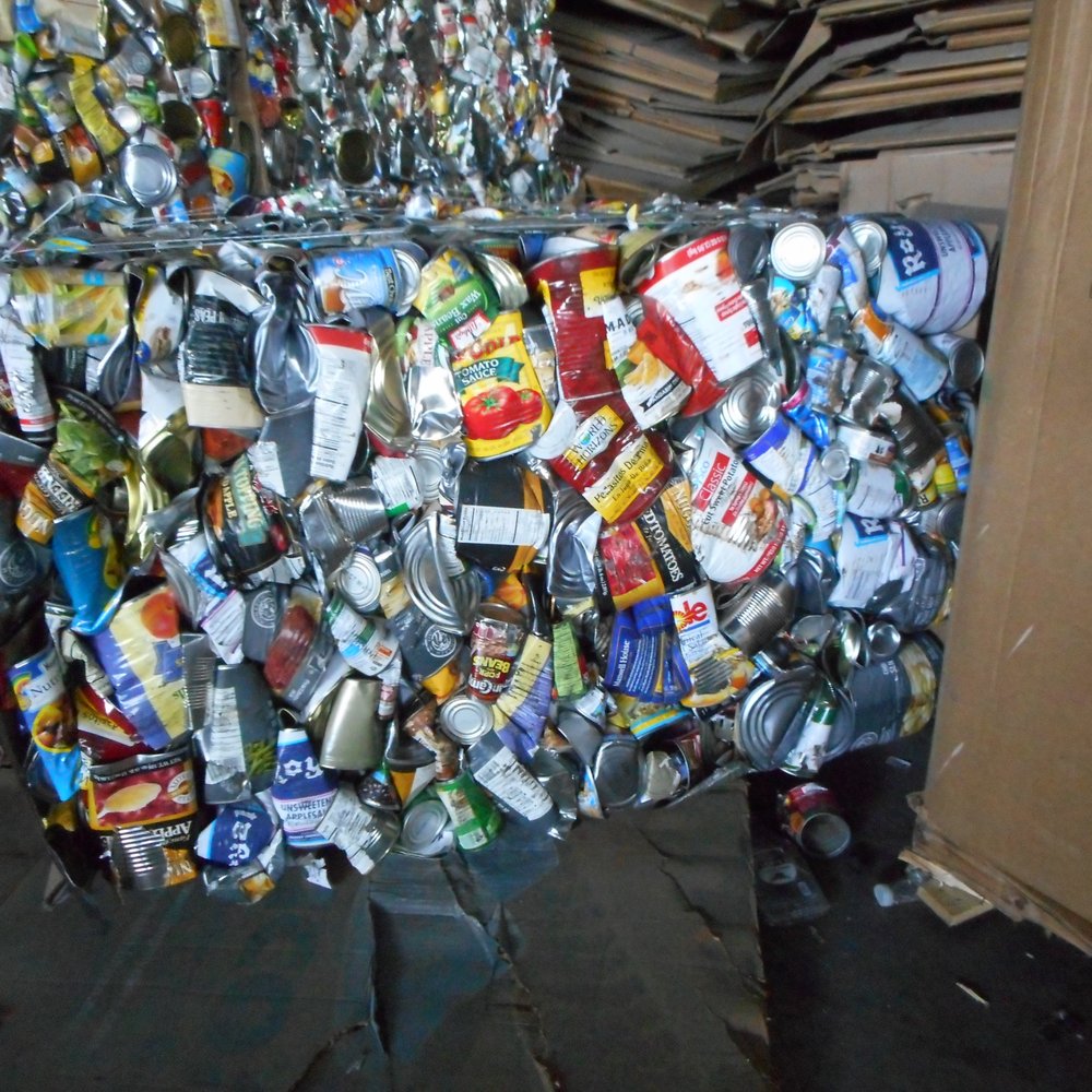 Junk Champs Junk Removal team sorting items for eco-friendly recycling and donation in Lancaster County